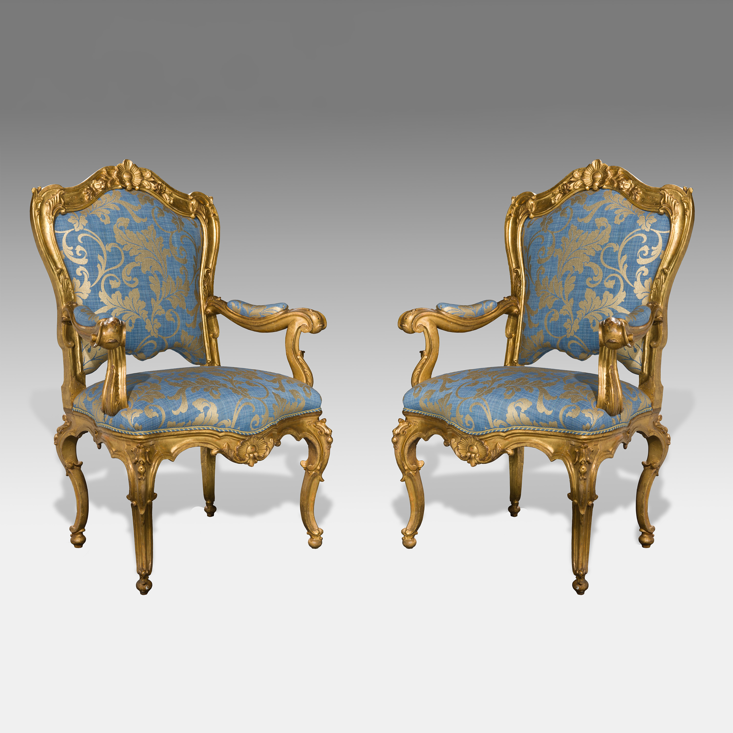 Coppia di poltrone dorate